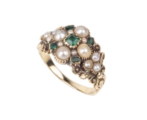 A 19th century gem set panel ring, centred with a quatrefoil-shaped cluster of half pearls and foil-backed step-cut green sto
