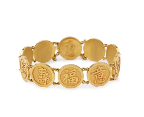A 22ct gold panel bracelet, designed as a series of disc-shaped panels decorated with Eastern character motifs, with London i