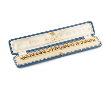 A late 19th/early 20th century ruby and diamond bracelet, designed as a line of alternating hoop and brick-shaped links, cent