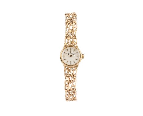 A lady's 9ct gold bracelet watch by Omega, the circular silvered dial with baton markers, to a calibre 484 manual wind moveme