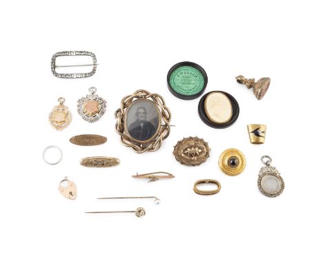 A collection of antique and later jewellery, to include a 19th century garnet set panel brooch, applied with ropetwist wirewo