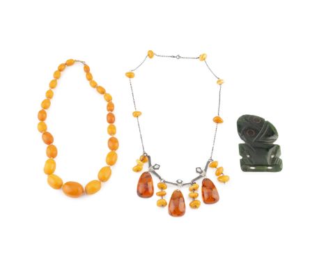 An amber bead necklace, designed as a single strand of oval amber beads graduating from approximately 10.8mm to 24mm in lengt