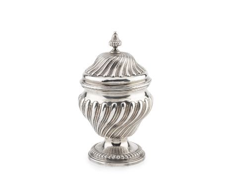 An early George III silver sugar vase and cover, of spirally lobed baluster form with acorn shaped finial, maker's mark I.D, 