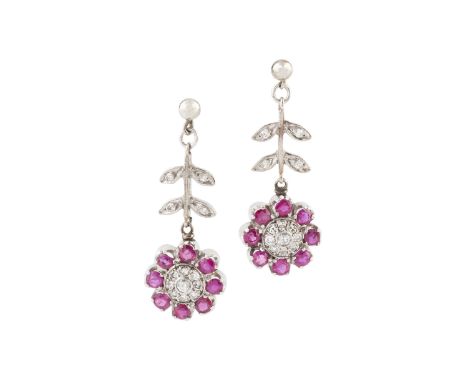 A pair of ruby and diamond ear pendants, each designed as a flowerhead cluster of Swiss and single-cut diamonds enclosed by c