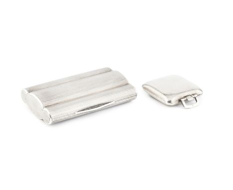 An early 20th century silver snuff box, of shaped and lobed design with engine turned decoration, import marks for C &amp; C,