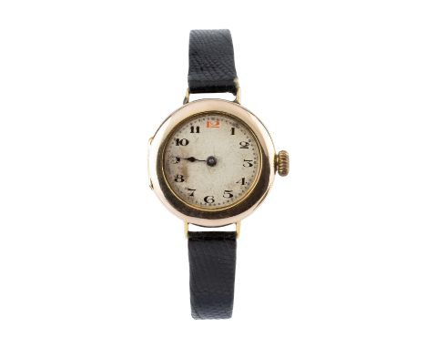 A 9ct gold cased watch head by Rolex, the circular silvered dial with red and black Arabic numerals, (minute hand deficient),