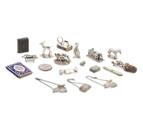 A collection of small silver items, to include a pair of mid-Victorian leaf shaped decanter labels for Brandy and Hollands, b