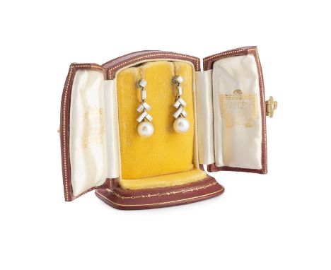 A pair of Art Deco natural pearl and diamond ear pendants by Cartier, each natural saltwater pearl drop surmounted by chevron
