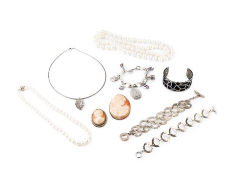 A collection of jewellery, comprising two freshwater pearl single strand necklaces, the shortest with bi-colour clasp stamped