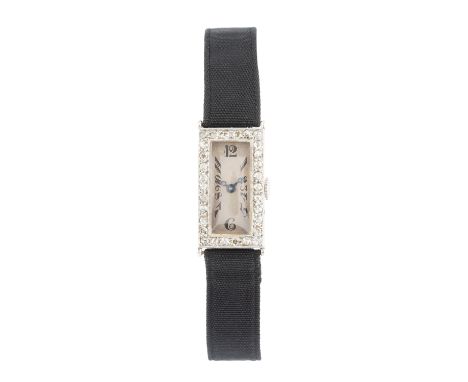 A diamond cocktail watch, the rectangular silvered dial with Arabic numerals, to a scroll engraved case with single-cut diamo
