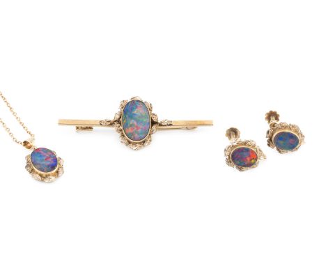 A collection of opal doublet jewellery, comprising a pendant, bar brooch and ear clips, each with foliate surround and stampe