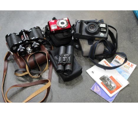 Nikon Cool Pics digital camera, Pentax 35 mm camera and two pairs of binoculars 