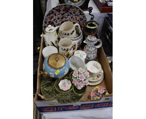 Box of jugs, coffee grinder, floral ornaments, cups and saucers etc 