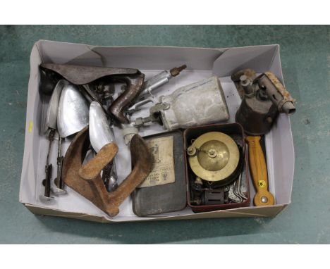 Box of tools, primer stove, blow torch, shoe stretchers, plane etc