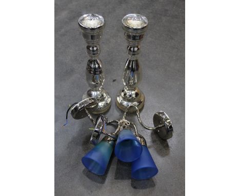 Two silver glass candlesticks, 2 wall light fittings 
