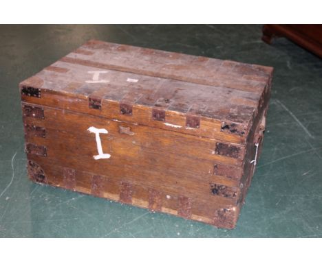 Metal bound trunk with carrying handles, length 74 cm