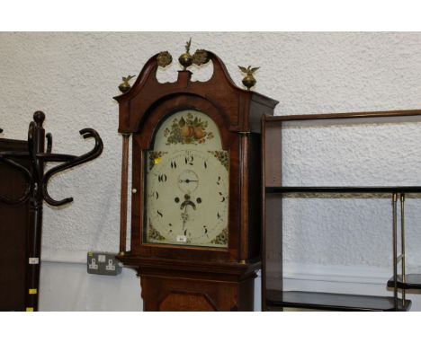 Oak cased eight day longcase clock with painted dial, weights and pendulum, height 215 cm