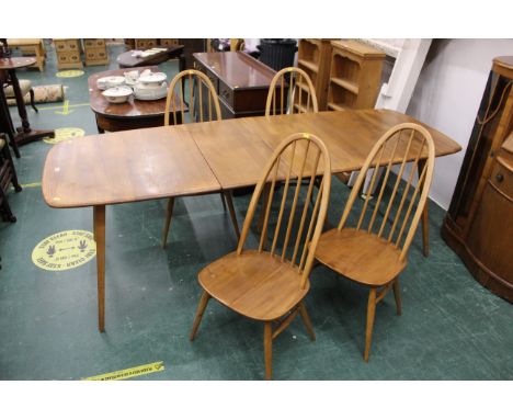 Ercol dining table with central fifth leg, 2 leaves and 4 dining chairs, length when fully extended 223 cm 