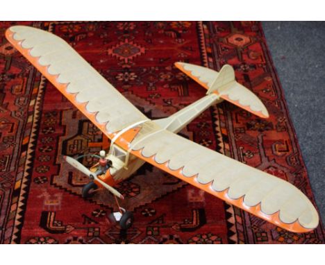 Model aeroplane - from the Walton collection, Classic Tomboy, fabric covered, finished in orange and black trim, CRE monogram