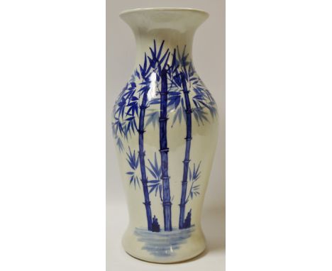 A Chinese blue and white baluster shaped vase decorated with sprouting bamboo shoots 