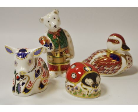 A Royal Crown Derby paperweight, Ladybird, first quality, printed marks to base; duck, first quality; pig and teddy bear; box