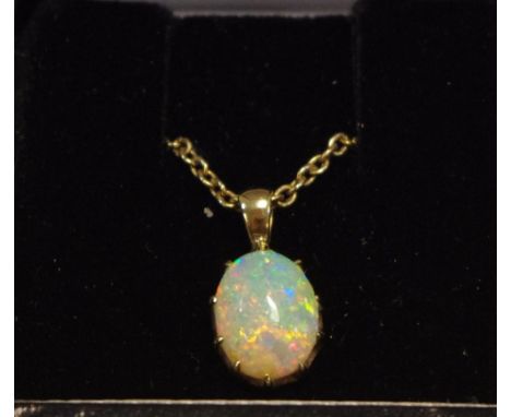 A 9ct gold and opal chain and pendant