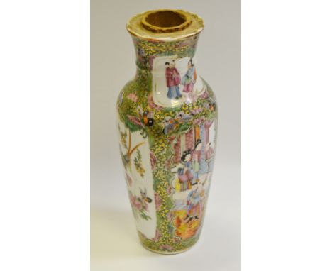 A 19th century Chinese baluster shaped vase decorated with figures amongst the palace walls, exotic birds and butterfly's on 