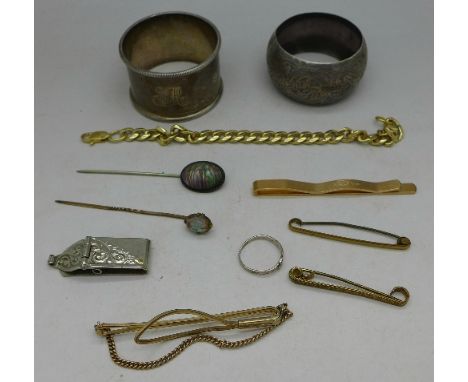 Two silver napkin rings, weight 42.7g, a bracelet, two pins, a 9ct gold back and front tie pin, etc.
