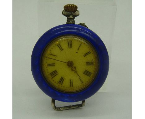 A silver and enamel wristwatch head