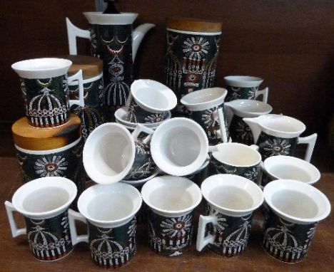 A Portmeirion Magic City coffee service comprising coffee pot, cream, sugar, sixteen cups and eight saucers, three storage ja