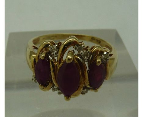 A 10k gold and ruby ring, weight 3.4g, size P