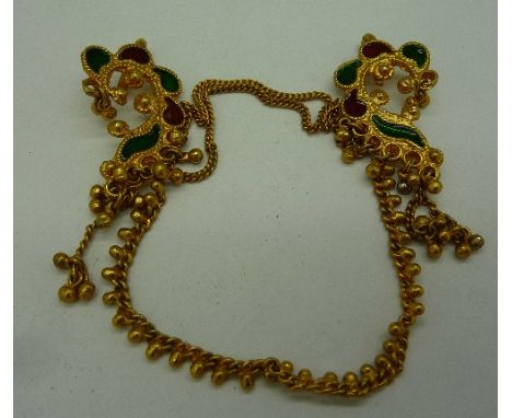 A metal and enamel necklet