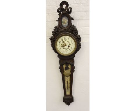 A large French late 19thC banjo style barometer, the heavily carved surround surmounted by a tri-colour jasper porcelain plaq