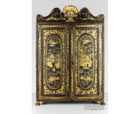 A fine Chinese export lacquer table cabinet c1850, the rectangular black and two coloured gold lacquer cabinet with two doors