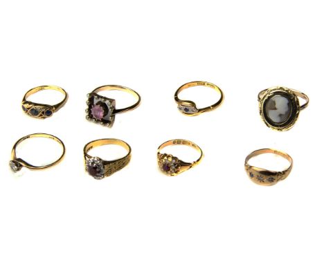 A group of eight gem set and gold rings, including a pink tourmaline and split pearl ring, c1910; a ruby and rose cut diamond