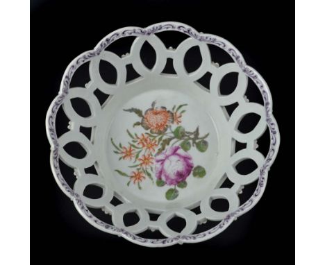 A Worcester porcelain basket, c1765, circular, the sides pierced with overlapping concentric rings, moulded with florets at t