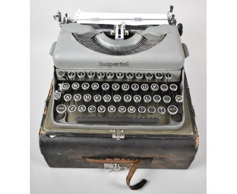 A Cased Vintage Imperial Manual Portable Typewriter 