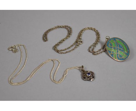 Two Celtic Pendants on Silver Chains 
