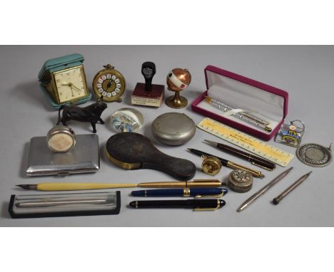 A Collection of Curios to Include Scale Rule, Cigarette Case, Portable Alarm Clock, Paperweights, Magnifying Glass, Spanish B