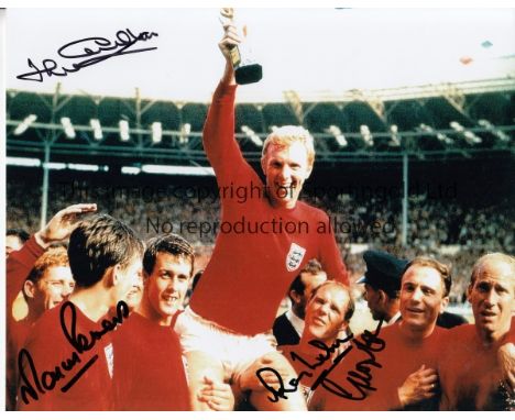 WORLD CUP 1966 AUTOGRAPHS      Four signed 10" X 8" photographs: Colour of Bobby Moore holding the trophy aloft on the lap of