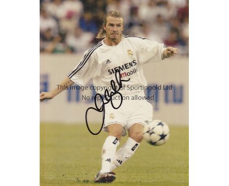 DAVID BECKHAM AUTOGRAPH         A 10" X 8" signed colour action photograph of Beckham playing for Real Madrid with a Certific