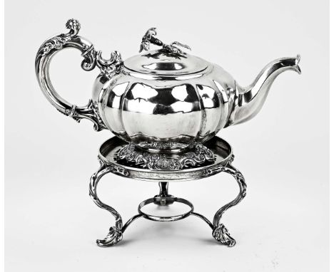 Silver teapot on stove. Comfoor, 934/000, with curled legs with a floral decoration, MT.: Bonebakker, Amsterdam, jl.: B:1886,
