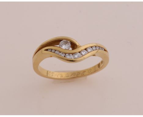 Yellow gold ring, 750/000, Christian Bauer. Fantasy ring in wave model with brilliant cut diamonds, 0.28 ct in total, TW/SI, 