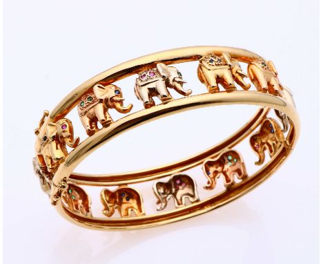 Beautiful yellow gold slave bracelet, 750/000, with white, red and yellow gold elephants, set with ruby, sapphire and emerald