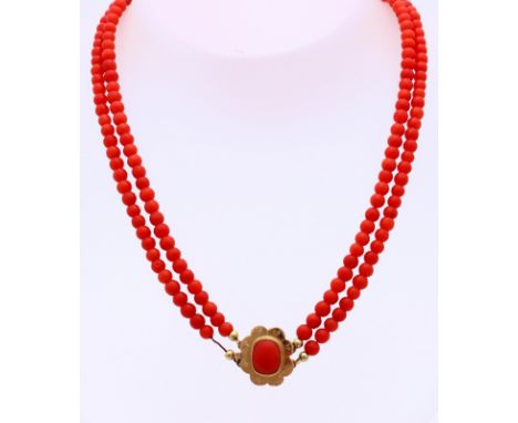 Necklace with 2 rows of red coral, ø 4.5 mm, with a yellow gold lock, 585/000, oval model with flower shape and engraving and