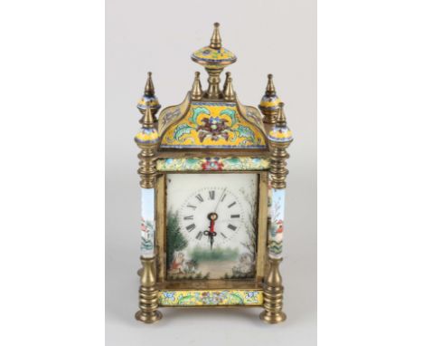 Chinese cloisonne brass table clock with enamel dial. Glass is missing. Second half of the 20th century. Dimensions: H 28 cm.