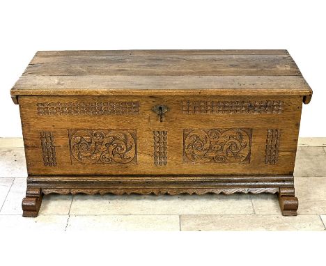 19th century German oak blanket chest with sled legs and carving. Dimensions: 59 x 124 x 51 cm. In good condition.