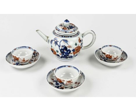 Seven parts 18th century Chinese Imari porcelain. Consisting of: large teapot (damaged), three saucers (two hairline, 1 good)