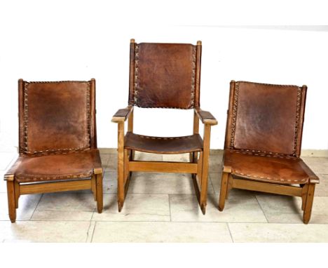 Three designer chairs. 2x low model + 1x rocking chair. 60s - 70s. Hardwood with brown leather. Maker? Danish? One bond loose