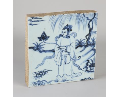 Large thick Chinese porcelain tile with a figure in a landscape decor. Dimensions: 20 x 20 x 3 cm. In good condition.